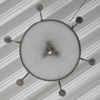 Firma Svenskt Tenn, a pewter and brass chandelier, Stockholm 1926.