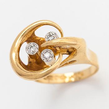 Björn Weckström, An 18K gold ring, with octagon-cut diamonds totalling ca 0.06 ct according to engraving. Lapponia 1974.