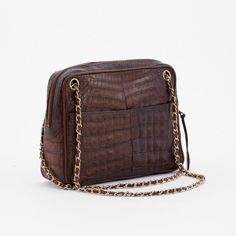 CHANEL, a brown crocodile shoulderbag from the 1980s.