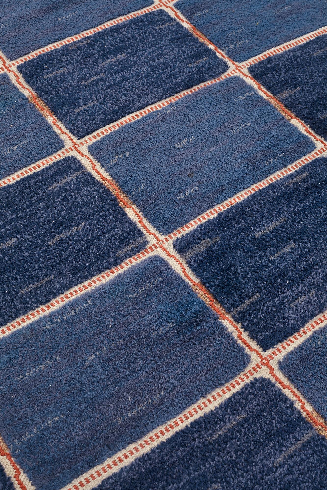 Märta Måås-Fjetterström, A CARPET, "Rutig blå halvflossa", knotted pile in relief, ca 304 x 209,5 cm, signed AB MMF.