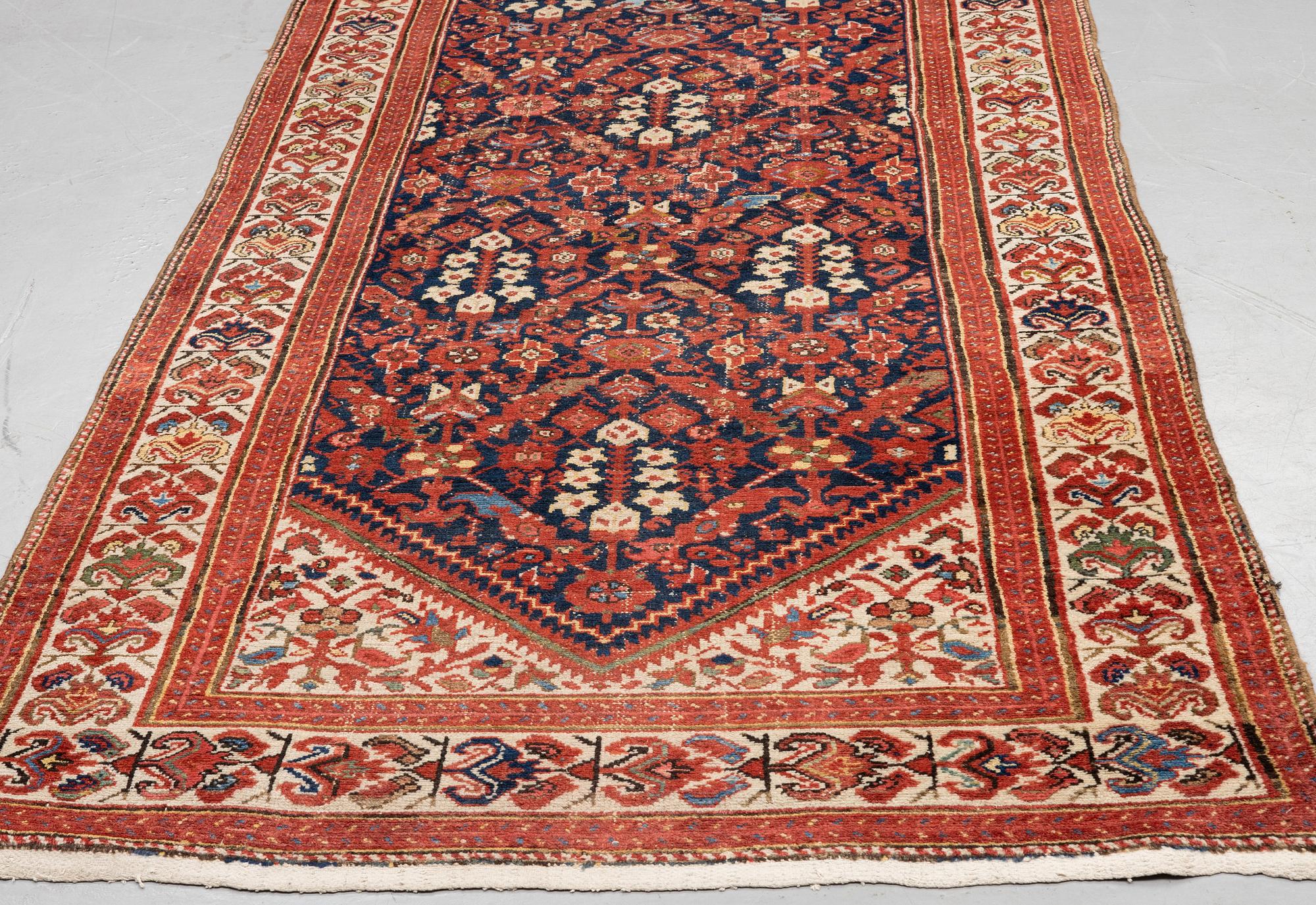 A runner, antique, Malajir, ca 510 x 147 cm.