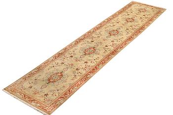 A Tabriz carpet, part silk, 50 raj, a. 508 x 85 cm.