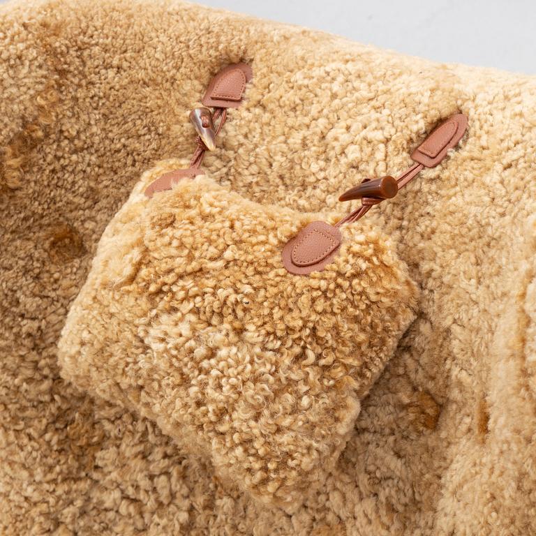 Fåtölj med fotpall, 1900-talets första hälft.