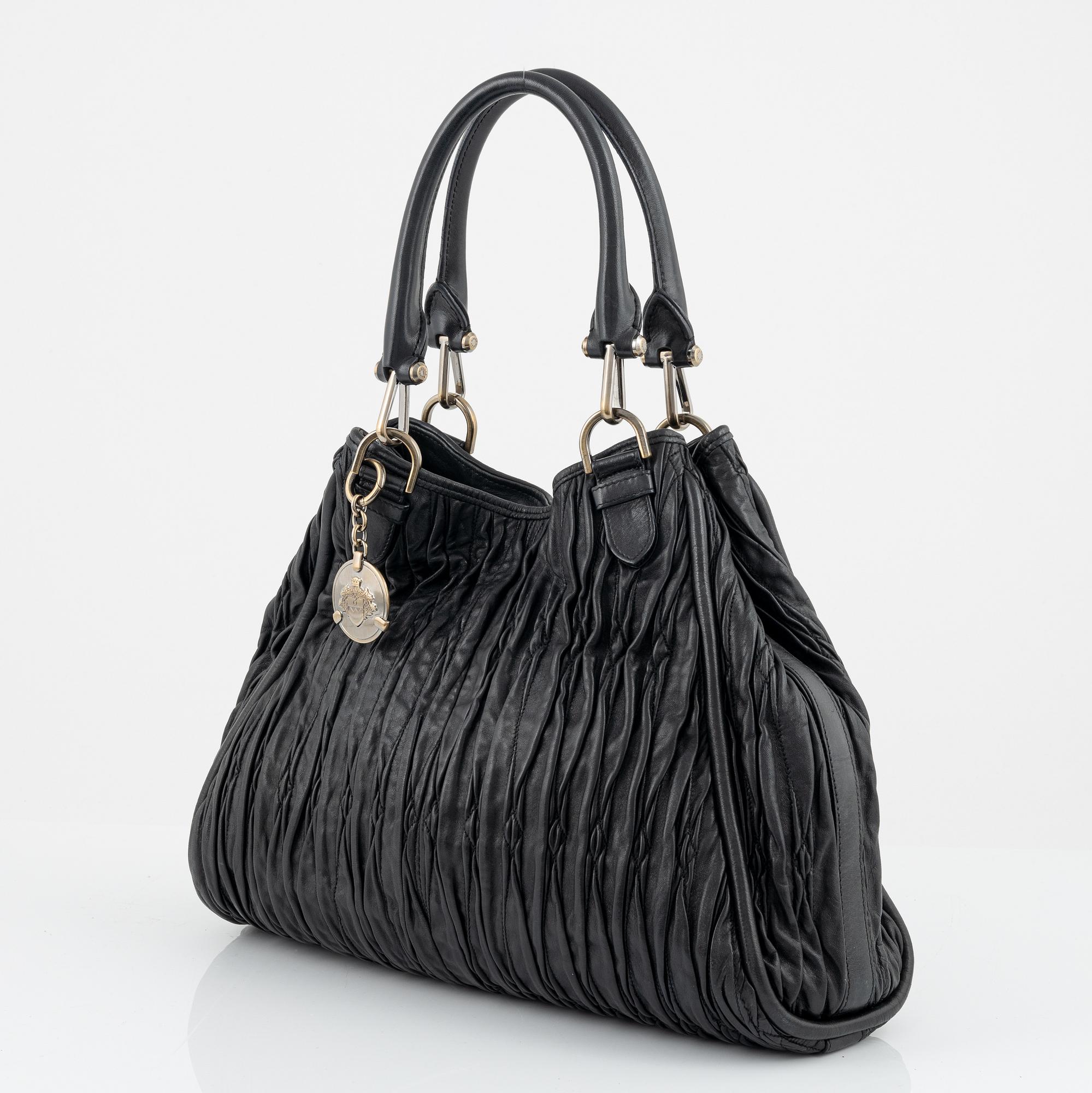 Bally, A black leather bag.