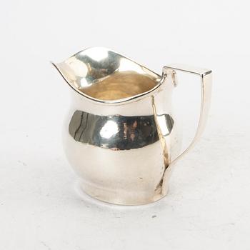 A 20th century silver milk pitcher London 1917 weight 260 grams.