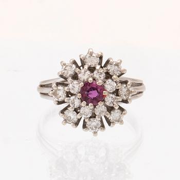 An 18K white gold ring set with a ruby and diamonds by Per-G Forslund Juvelateljén Malmö 1982.