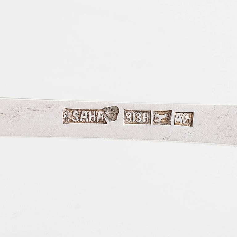 Ilmari Saha, a 12-piece set of silver table spoons in original boxes, Pori, Finland 1927-31.