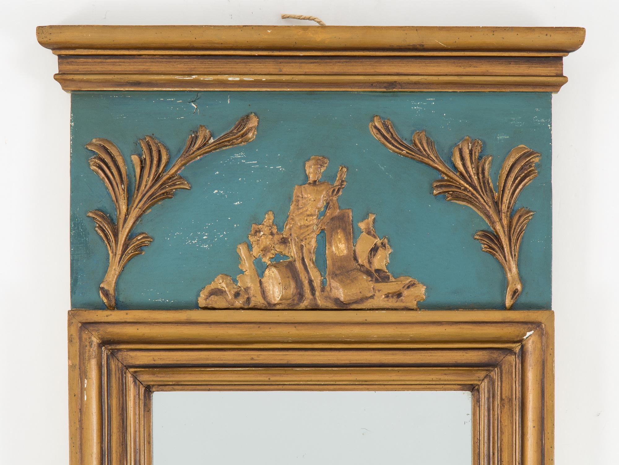An Empire mirror marked W Lind, first half of the 19th century.