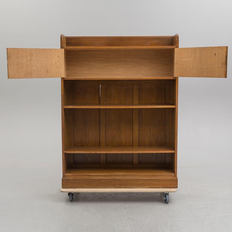 An early 20th century bookcase /  cabinet.