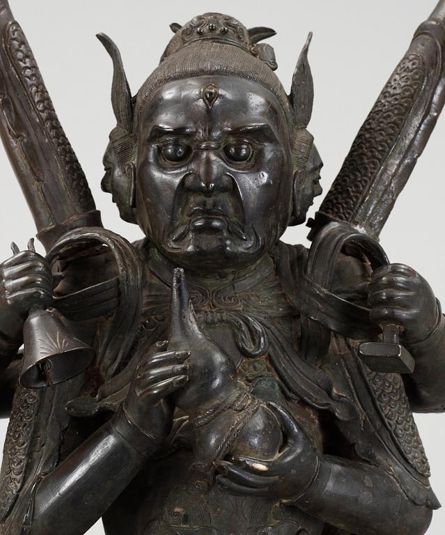 A massive Japanese bronze figure of a deity, 19th Century.