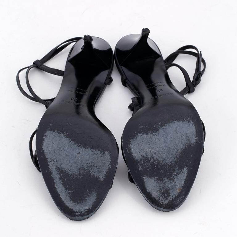 HERMÈS, a pair of black leather sandals. Size 38.
