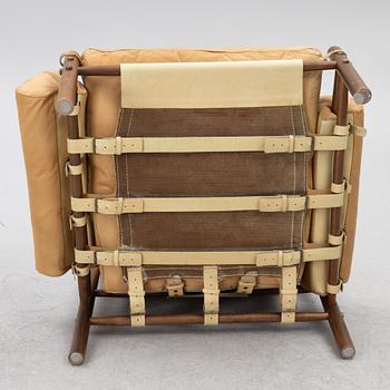 Arne Norell, Armchair with an ottoman, 'Inka', Norell Möbel AB, 1970s.