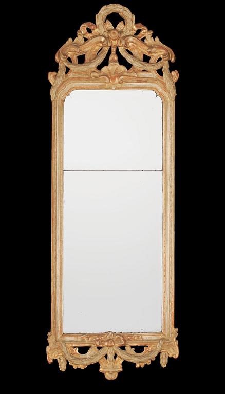 A Gustavian mirror by N Meunier dated 1772.