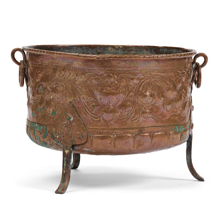 A Swedish baroque repousse copper cauldron, early 18th century.