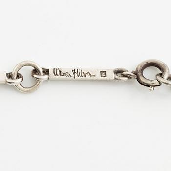 Wiwen Nilsson, a pendant in the form of a cross, sterling silver with onyx and step-cut rock crystal, Lund 1937.