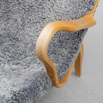 Bruno Mathsson, lounge chair, "Pernilla 3" with reading table, Firma Karl Mathsson, Värnamo, 1965-71.