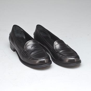 SKOR, dam, Prada, loafers.