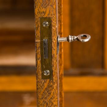 A 1920's oak cabinet.