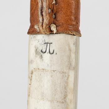 A reindeer horn knife by Johan Tuuri, signed.