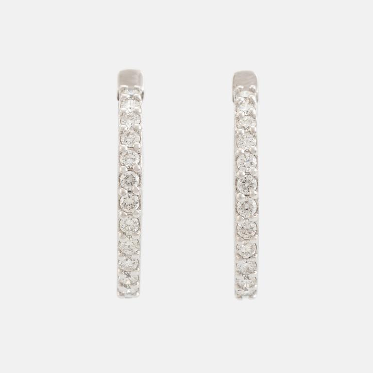Brilliant cut diamond hoop earrings.