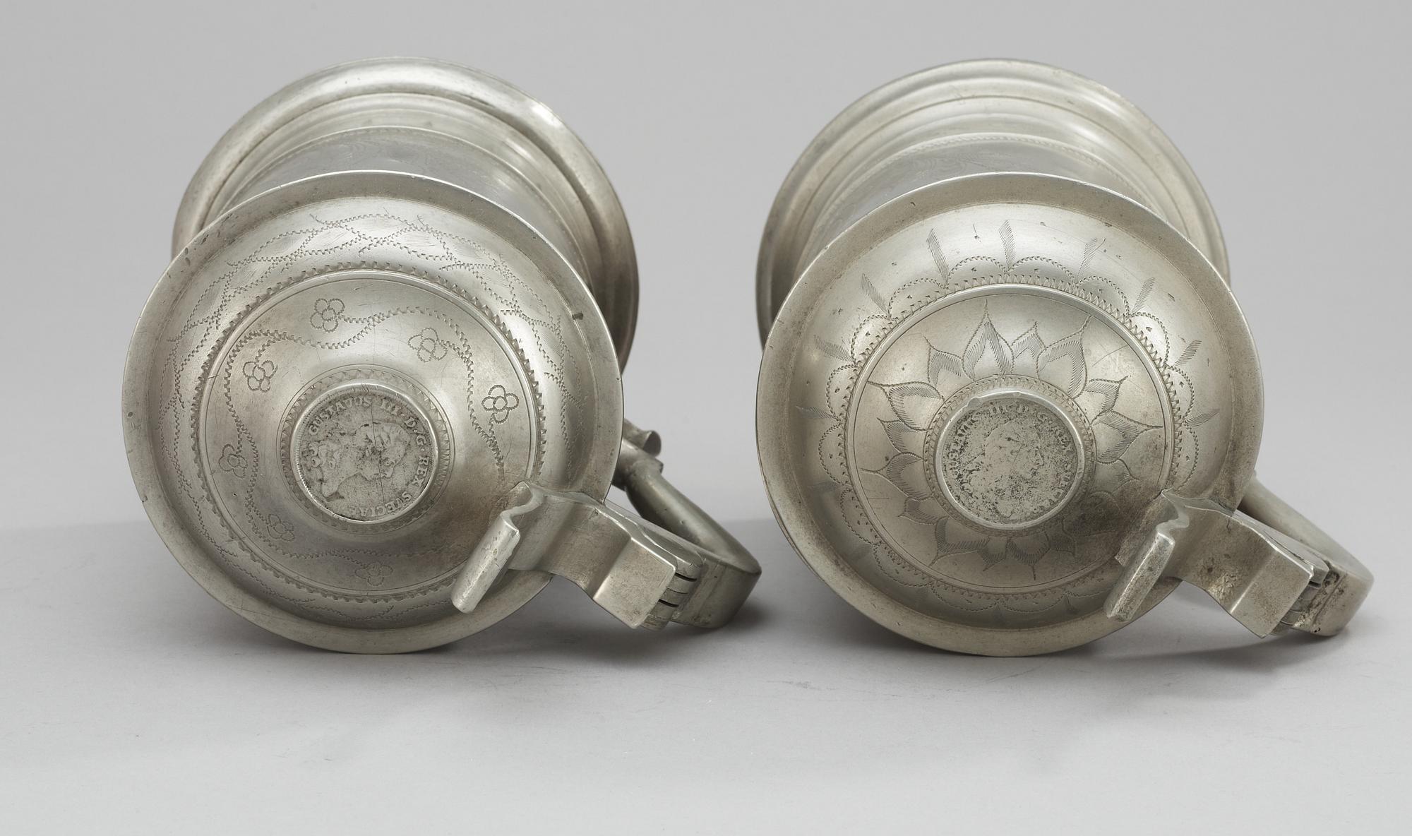 A set of two pewter pints. Makers mark by Gottlob F Bauman, Hudiksvall (1789-1826/31).