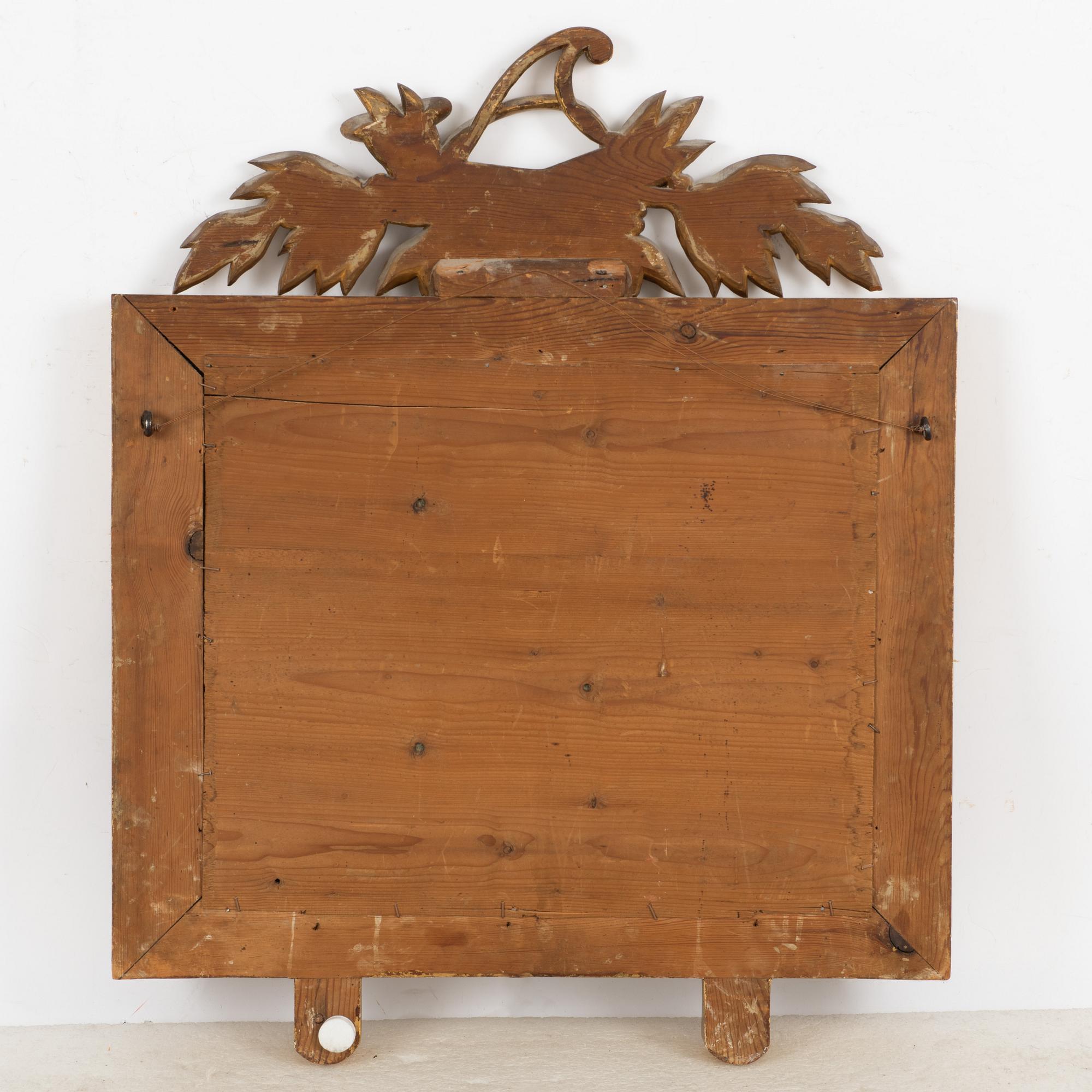 A mirrior wall sconce, 19th century.