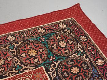 A Suzani textile, ca 247 x 128 cm.