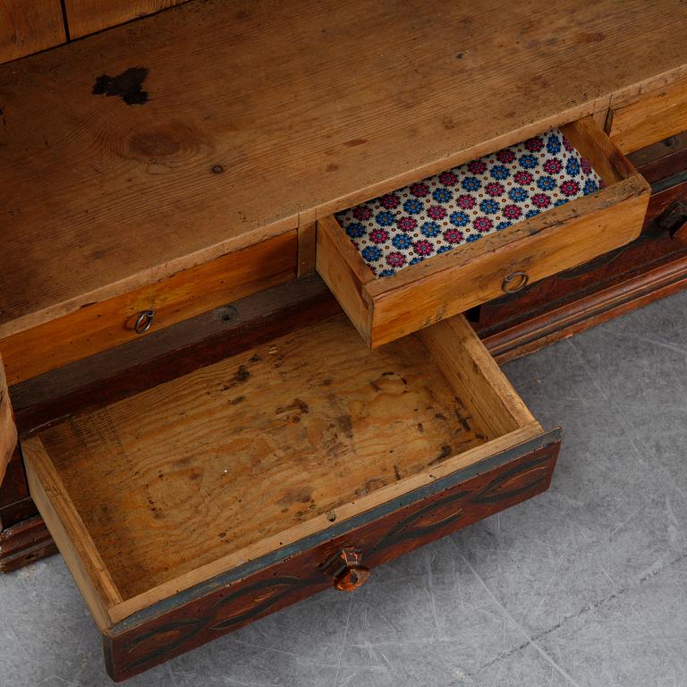 A Swedish provincial painted wall hanging cabinet, dated 1852.