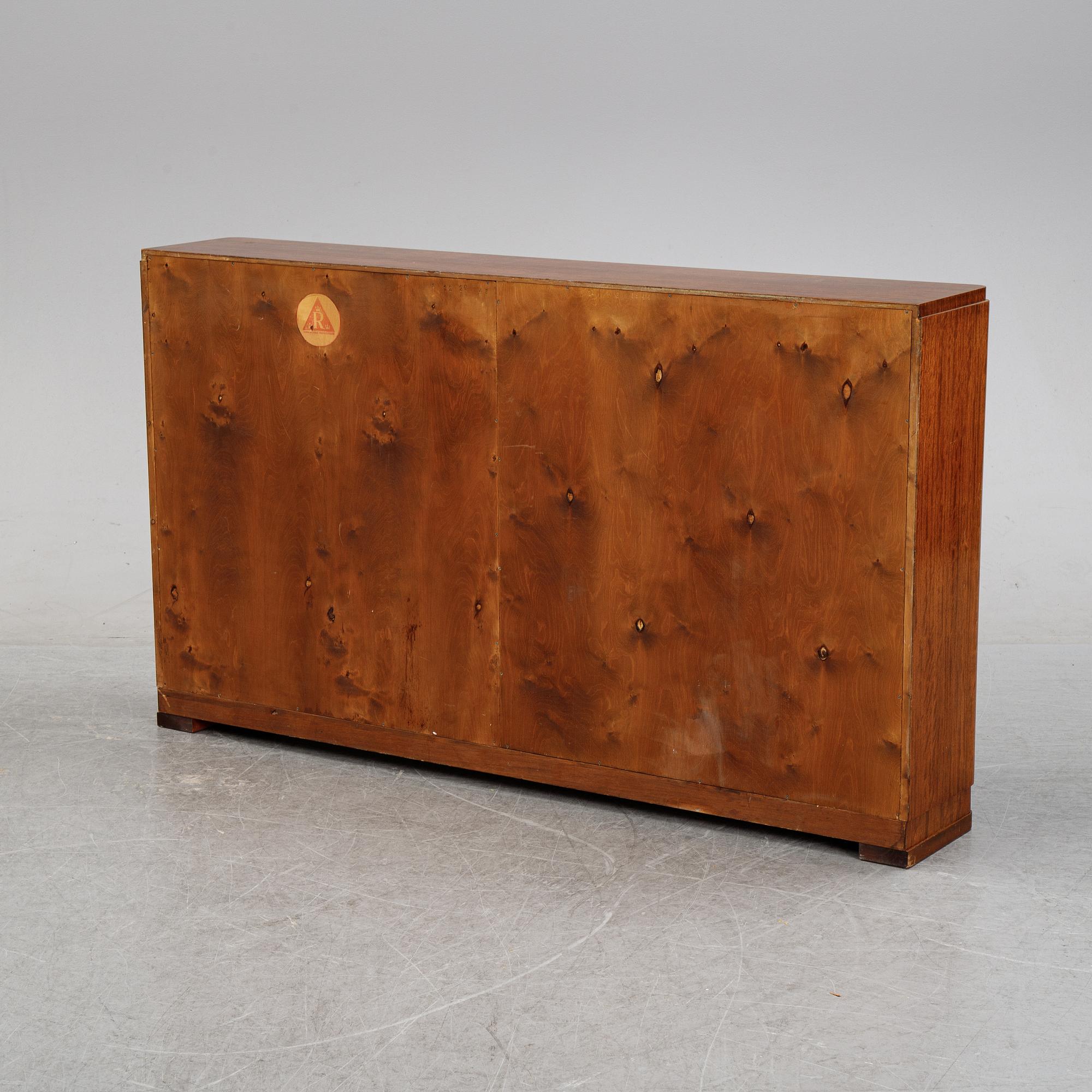 A mahogany veneered book shelf, Reiners Möbler, Mjölby, 1930's/40's.
