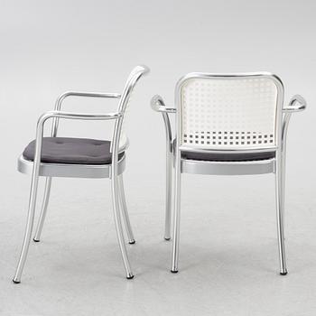 Vico Magistretti, a "Shine" dining table with twelve chairs, De Padova, Italy, around the year 2000.