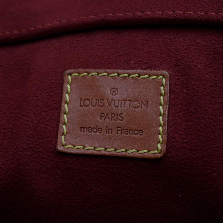 LOUIS VUITTON, a brown leather handbag.