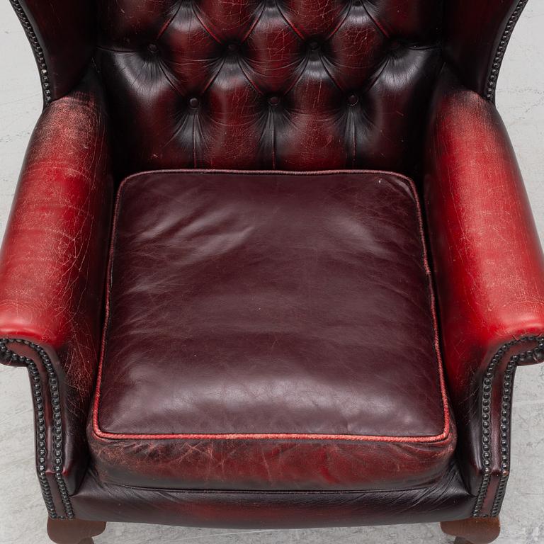 A pair of leather armchairs, end of the 20th century.