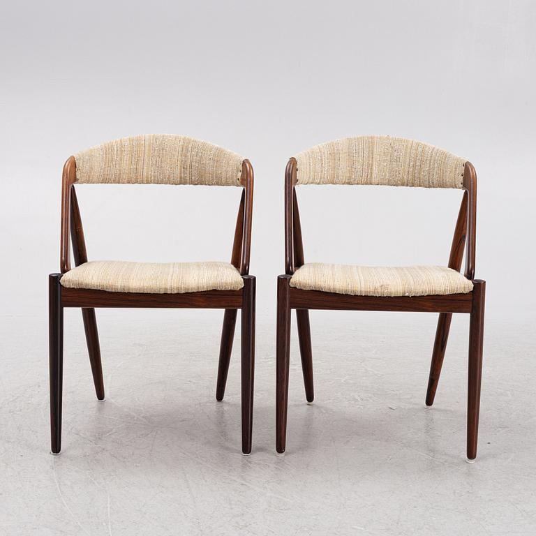 Kai Kristiansen, a set of four 'Pige' chairs and a dining table, Denmark, 1960's.