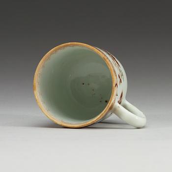 A famille rose armorial cup, Qing dynasty, Yongzheng (1723-35).