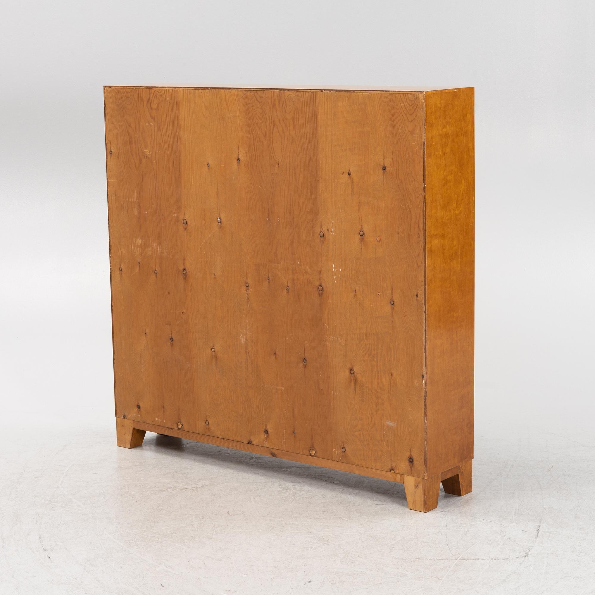 A birch veneered book case, 1930s/40s.