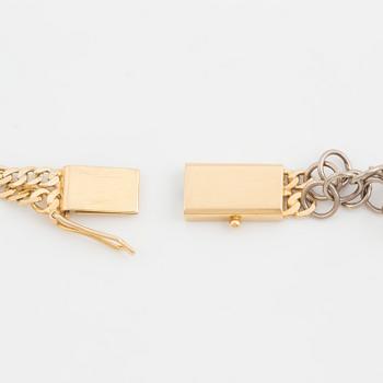 A two-rowed, flattened curb-link necklace.