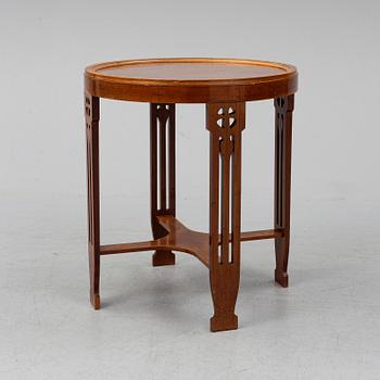 A copper and mahogany table by Nordiska kompaniet.