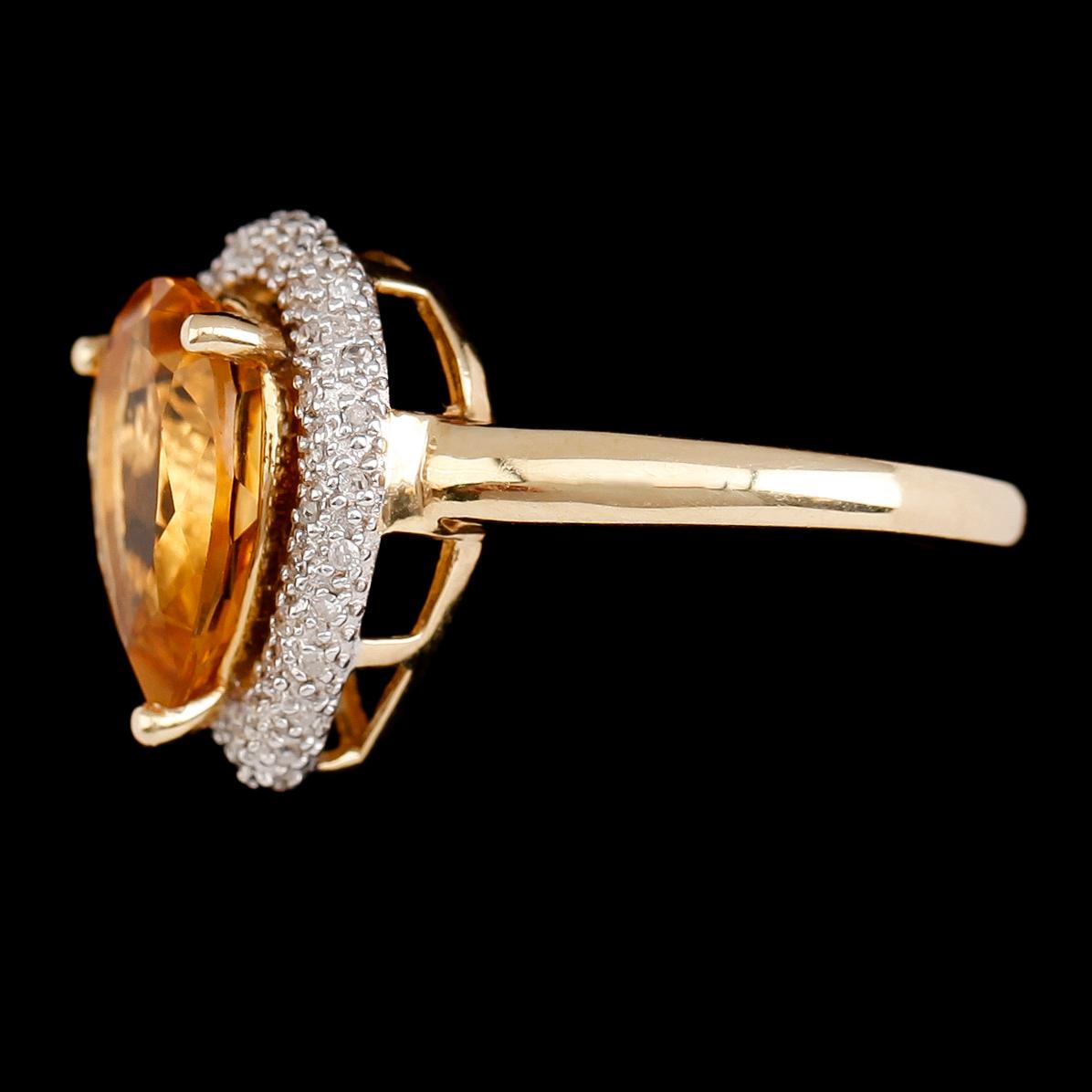 RING, 14 k guld, droppformad citrin, mindre diamanter tot ca 0.14 ct.