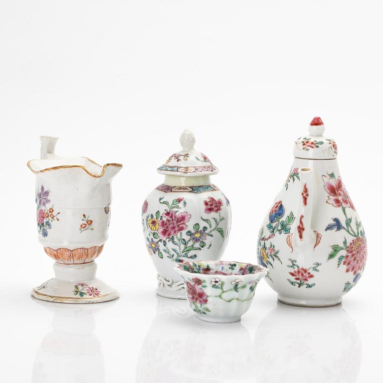 A group of two jugs, a cup and a jar with cover, famille rose porcelain, China, Qing dynasty, 18th century.