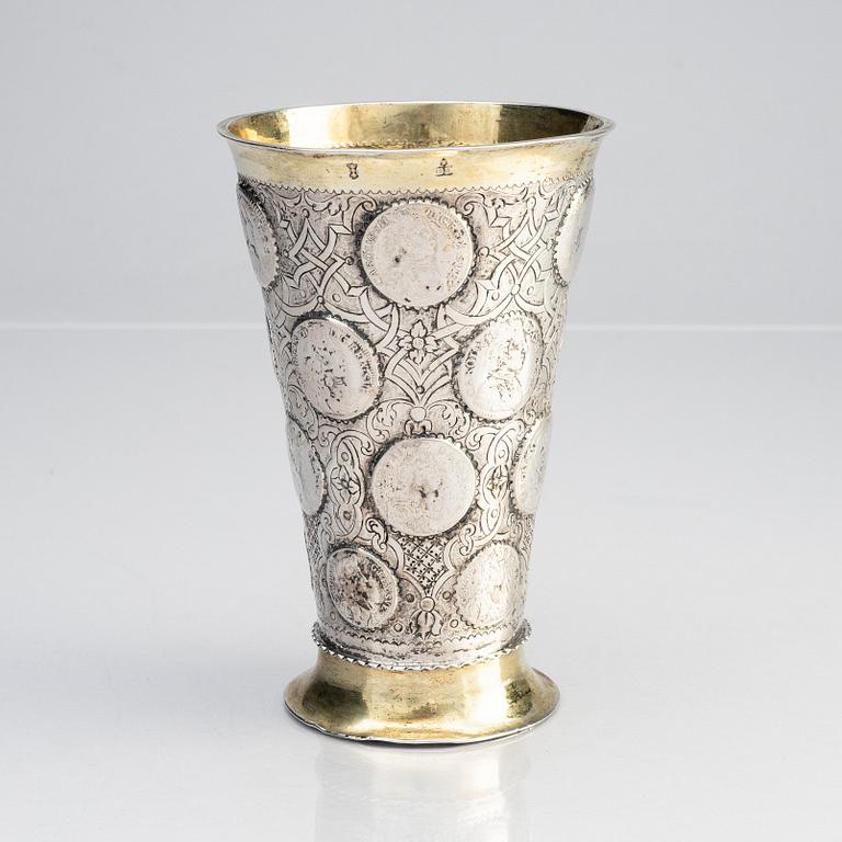 A Polish 18th century parcel-gilt silver coin beaker, mark of Benjamin Berent, Danzig (active 1713-1756).