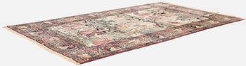 An antique pictoral Kerman rug, ca. 229 x 144 cm.