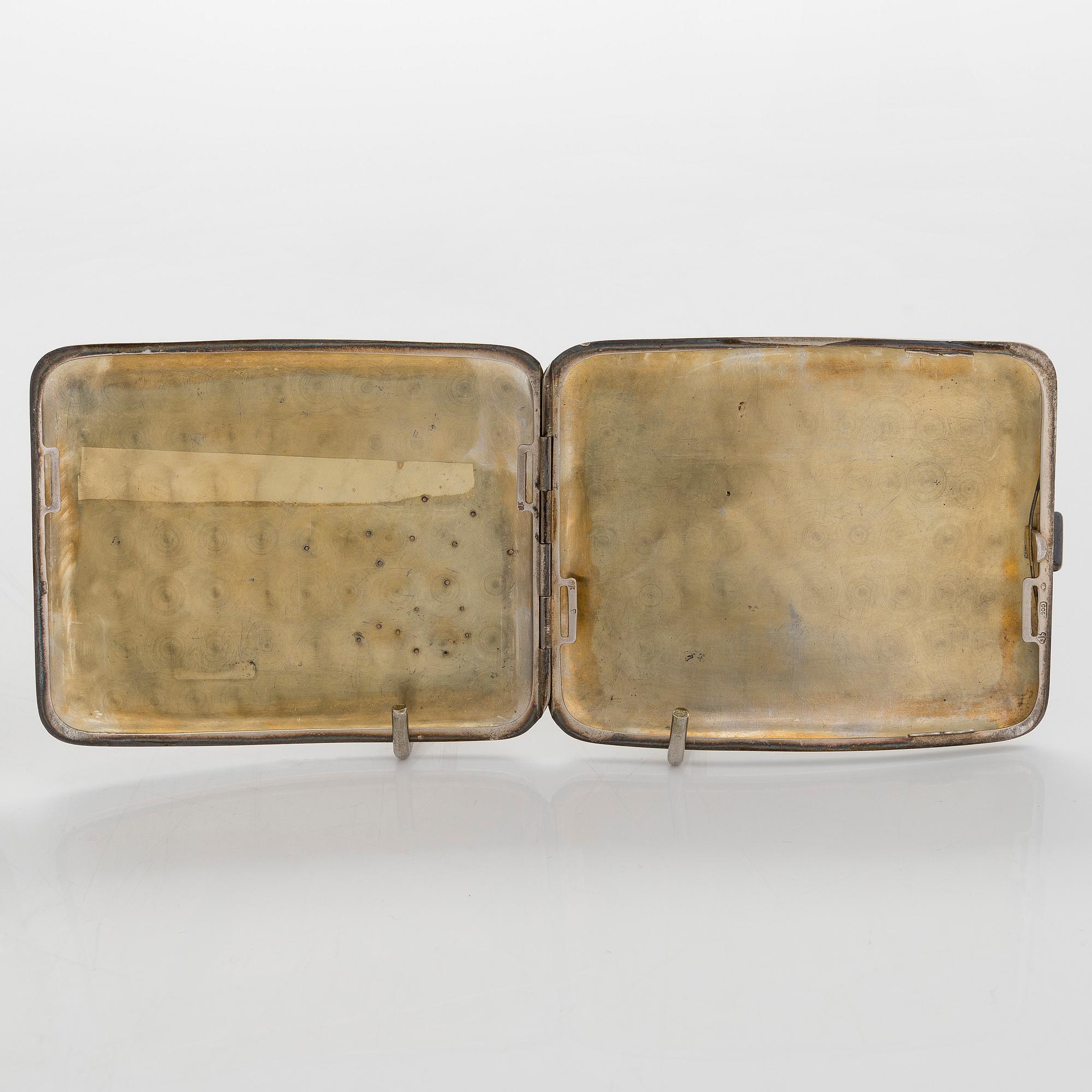 Two silver cigarette cases, J. H. Werner, Berlin, 1922, and Huguenin Frères, Switzerland before 1933.