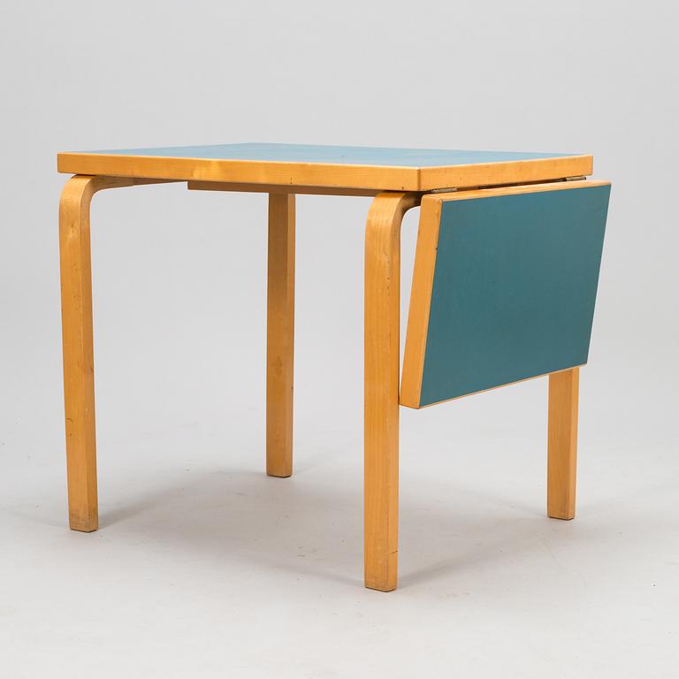 ALVAR AALTO, A mid-20th century drop leaf table for Artek Finland.