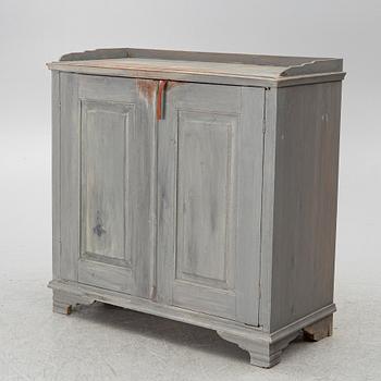 A Gustavian cupboard, circa 1800.