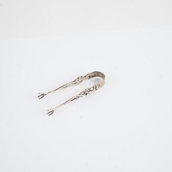Nine pieces of silver, England, Austria and Sweden.