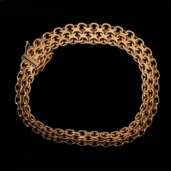 ARMBAND, 18k guld, 1959. Vikt ca 19 g.