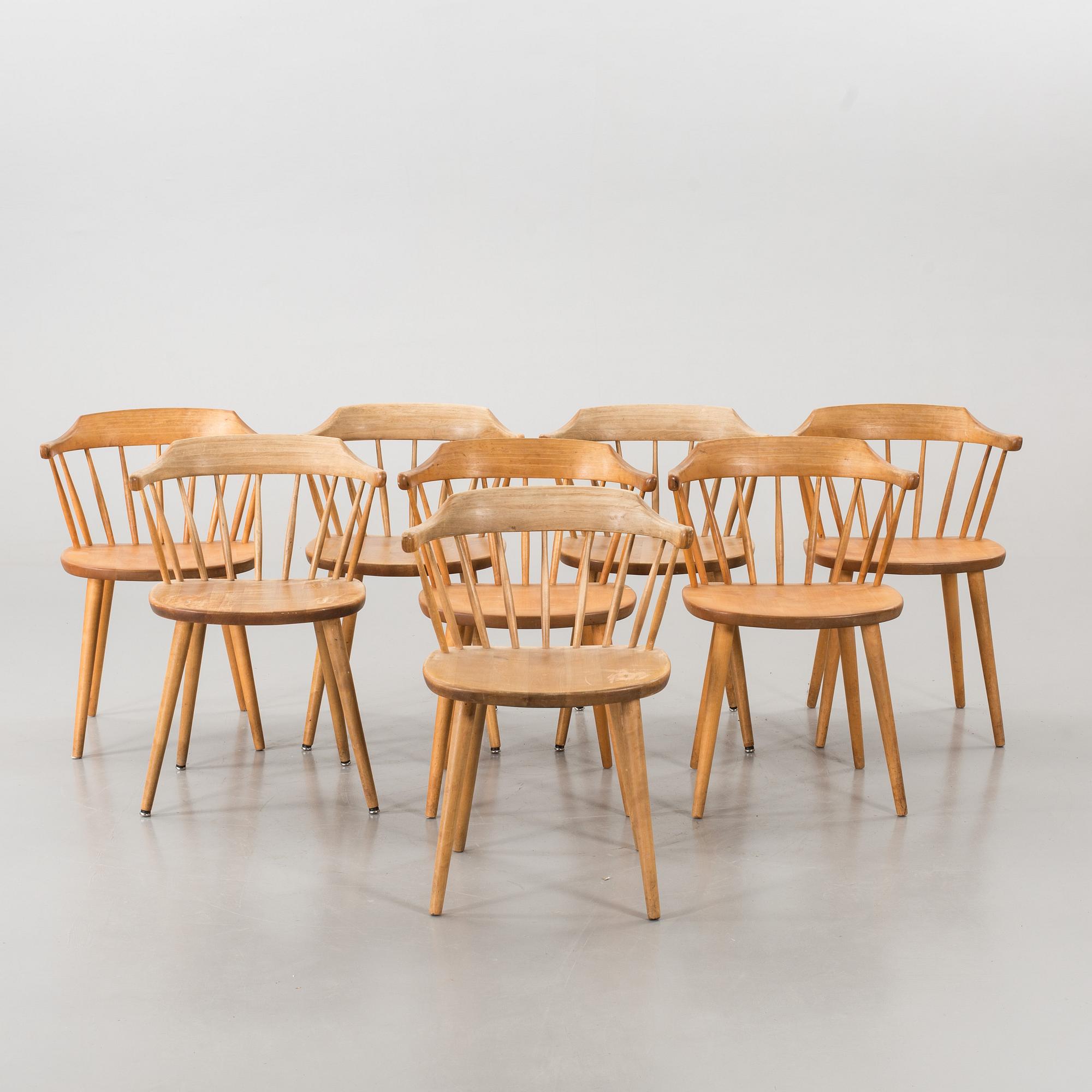 A SET OF EIGHT "SMÅLAND" CHAIRS DESIGNED BY YNGVE EKSTRÖM.