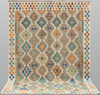 A Kilim rug, approx. 259 x 172 cm.