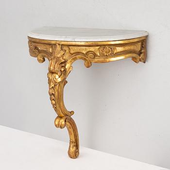 A Rococo style onsole table, circa 1900.
