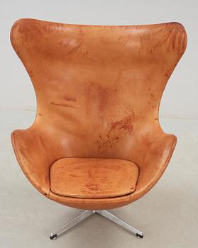 An Arne Jacobsen brown leather 'Egg Chair', Fritz Hansen, Denmark 1963.